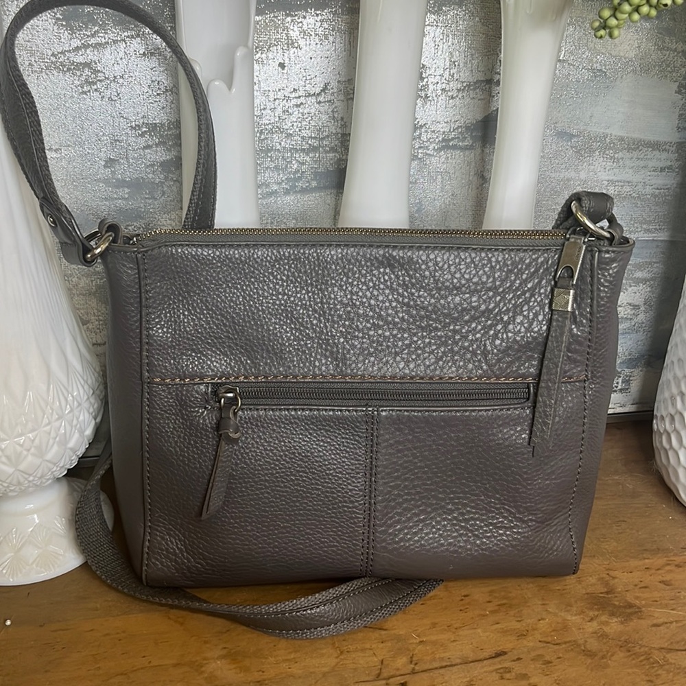 The Sak grey leather crossbody purse